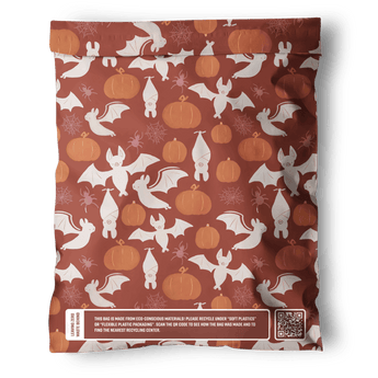 The impack.co SALE - Halloween Bats Mailers 10" x 13" US feature a festive orange-and-white pumpkin, bat, and bunny design with recycling info and QR code—biodegradable mailers for eco-friendly Halloween shipping.