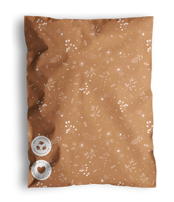 Decorative brown throw pillow with white botanical pattern and two impack.co Floral 2D Chestnut Biodegradable Mailers 12" x 15.5" as buttons.