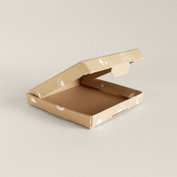 A "ABC Box Celestial 4" x 4" - Small" by impack.co with a celestial print on a white surface.