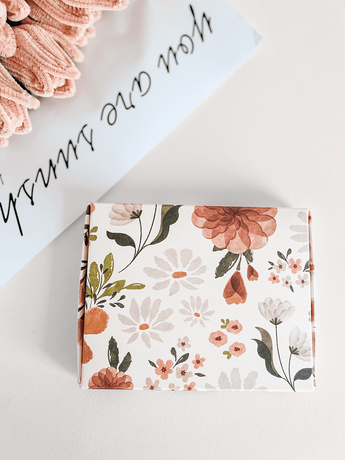 A stylish ABC Box Gardenlumina 4.8" x 6" - Medium gift box with a floral design, perfect for shipping, made by impack.co.