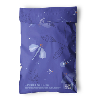 The impack.co Dragonfly Purple Biodegradable Mailers 6" x 9" feature a floral design with white flowers, the text "Leaving Zero Waste Behind," a QR code at the bottom right, and provide plastic-free packaging.