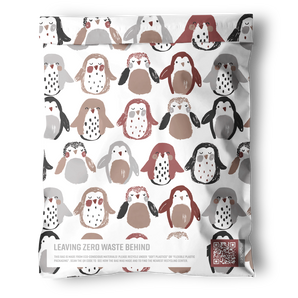 The impack.co Imperfect Penguins Mailers (14.5" x 19") are reusable, biodegradable mailers with a hand-drawn penguins print in brown, gray, and beige, plus "Leaving Zero Waste Behind" at the bottom.