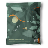 The Boho Green Leaves Biodegradable Mailers 14.5" x 19" from impack.co feature abstract leaf designs, the phrase “Leaving Zero Waste Behind,” and a QR code—a stylish, reusable alternative to regular packaging.