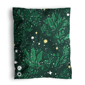 A patterned bandana with green foliage and star motifs on a dark background, packaged in impack.co Midnight Lush Mailers 10" x 13".