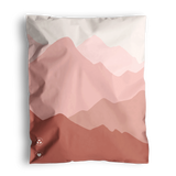 The SALE - Mountain Clay Mailers by impack.co, sized at 10" x 13", feature abstract pink and red mountain-like shapes, providing stylish transit protection for medium-sized shipments.