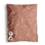The impack.co SALE - Floral 2D Rosy Brown Biodegradable Mailers (10" x 13") feature a white floral pattern on pinkish-brown fabric with two round labels and a green "SARASA SODA" tag—an eco-friendly, versatile packaging choice.