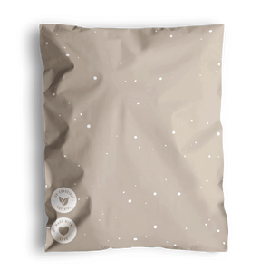 The impack.co SALE Sandstone Biodegradable Mailers (10" x 13") offer transit protection with an eco-friendly biodegradable design. They feature a subtle speckled beige pattern, two small circular logos at the bottom left, and "CANADA 2008" text at the top right.