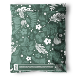 Impack.co’s Emerald Evergreen Biodegradable Mailers (10" x 13") feature a green bag with a white floral and leaf pattern and a recyclability message box—perfect for plastic-free packaging or compostable mailers.