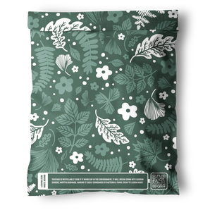 Impack.co’s Emerald Evergreen Biodegradable Mailers (10" x 13") feature a green bag with a white floral and leaf pattern and a recyclability message box—perfect for plastic-free packaging or compostable mailers.