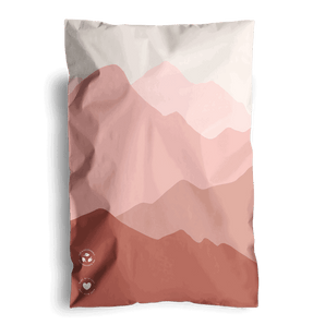 The impack.co SALE - Mountain Clay Mailers 6" x 9" CA features a minimalist design of pink and red layered mountains, with two icons in the bottom left corner. These mailers are shipped sustainably to ensure safe delivery while being eco-conscious.