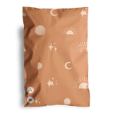 The impack.co SALE - Celestial Tan Mailers 6" x 9" CA features a stylish brown design with celestial tan prints of suns, moons, and stars, along with two circular symbols on the bottom left corner, making them perfect for transit protection.