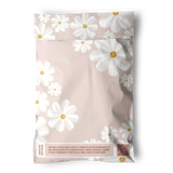 The Cosmos Biodegradable Mailers 6" x 9" from impack.co feature light pink color, white and yellow daisies, a sustainability message, and a QR code—perfect eco-friendly small shipping envelopes.