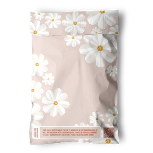 The Cosmos Biodegradable Mailers 6" x 9" from impack.co feature light pink color, white and yellow daisies, a sustainability message, and a QR code—perfect eco-friendly small shipping envelopes.