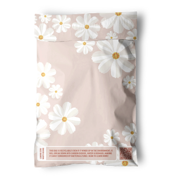 The Cosmos Biodegradable Mailers 6" x 9" from impack.co feature light pink color, white and yellow daisies, a sustainability message, and a QR code—perfect eco-friendly small shipping envelopes.