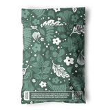 The impack.co Emerald Evergreen Biodegradable Mailers 6"x9" feature white botanical patterns, a printed sustainability message, and a QR code—ideal for those seeking eco-friendly, plastic-free packaging or compostable mailers.
