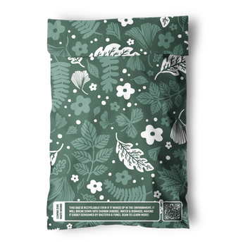 The impack.co Emerald Evergreen Biodegradable Mailers 6"x9" feature white botanical patterns, a printed sustainability message, and a QR code—ideal for those seeking eco-friendly, plastic-free packaging or compostable mailers.