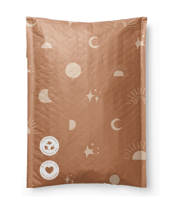 The SALE - Celestial Tan Biodegradable Bubble Mailers 8.5" x 12" CA by impack.co features moons, suns, stars, and smiley face designs. These eco-friendly mailers blend charm with sustainability for mindful shipping.