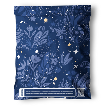 The Midnight Indigo Mailers 10" x 13" by impack.co come in a resealable blue bag with floral and star designs; the bottom label highlights eco-friendly, recyclable packaging and features a QR code.