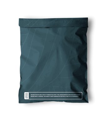 Back view of a Space Blue Leaf Biodegradable Mailers 14.5" x 19" with a white label on it from impack.co.