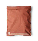 The SALE - Natural Cedar Leaf Biodegradable Mailers from impack.co, featuring a brown background with a cedar leaf design and white text highlighting its environmental benefits, boast a durable and eco-friendly construction. They measure 14.5" x 19".