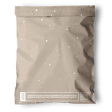 The SALE - Sandstone Biodegradable Mailers 10" x 13" from impack.co offer versatile, eco-friendly packaging with white speckles, a QR code, and sustainability text, ensuring excellent transit protection for your environmentally conscious deliveries.