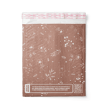 Back view of a Rosy Brown Biodegradable Bubble Mailers 6" x 9" with a floral design on it from impack.co.